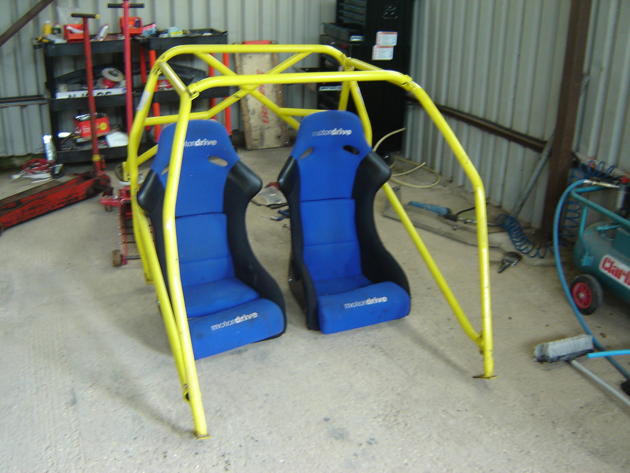 MK2 roll cage, bucket seats and 6 point harnesses (All sold)